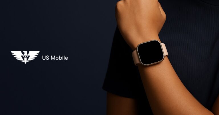 A person raising a wrist so the smartwatch screen faces the camera, with the us mobile logo on the left